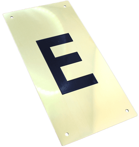 Tryckplåt, mässing, med symbol ''E'', svart fylld