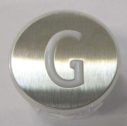 Trycke, KONE KSS, hög, relief, rund, rf, vit, symbol ''G''