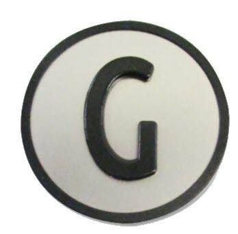 Tryckbricka, KONE KSS, grå, ''G'',  för förhöjd knapp